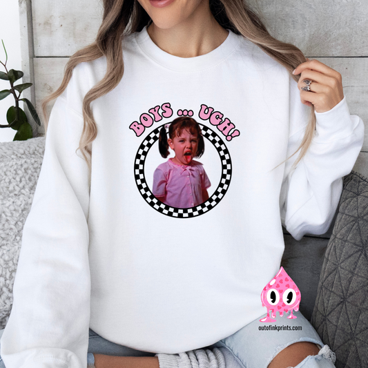 A person wearing a white sweatshirt with a black checkered pattern and the text 'BOYS... UGH!' printed on the front.
