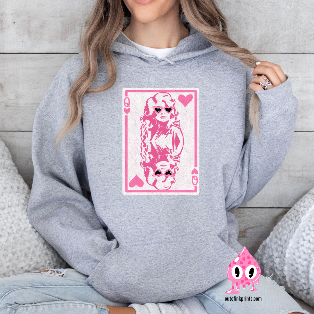Front view of grey sweatshirt with a queen of hearts card and Dolly's face