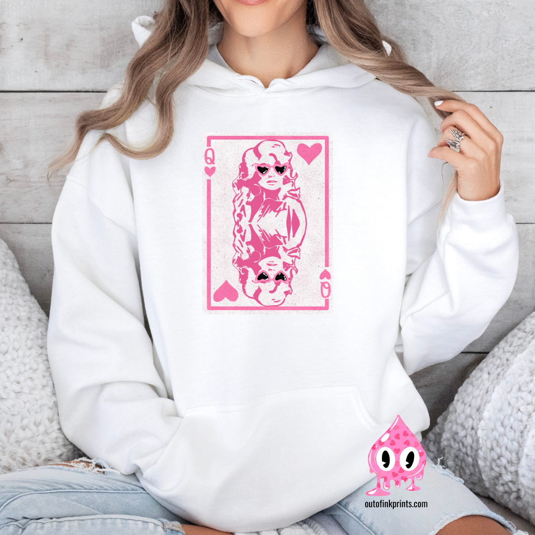 Front view of white sweatshirt with a queen of hearts card and Dolly's face