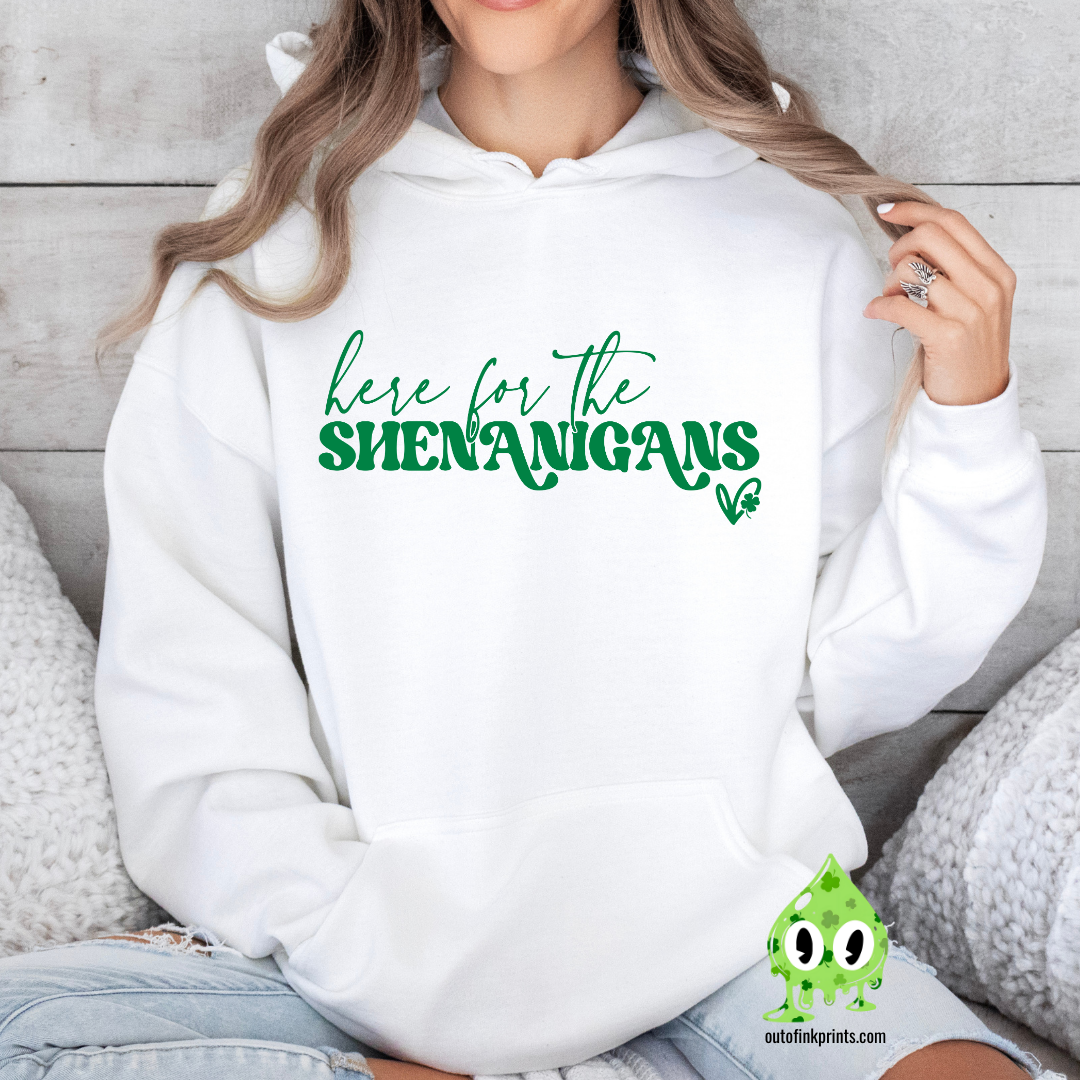 White hoodie with the text 'here for the SHENANIGANS' printed on the front.
