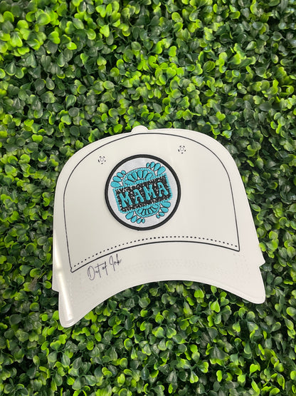 Circular patch with 'MAMA' text placed on a white trucker hat graphic