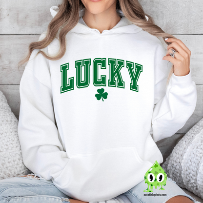 A white hoodie with the text 'LUCKY' and a clover leaf printed above the text.