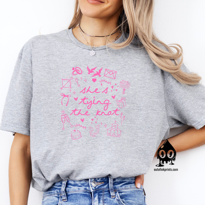 Front View of a Gray T-shirt with pink text and graphics related to weddings, brides, and bow ties.