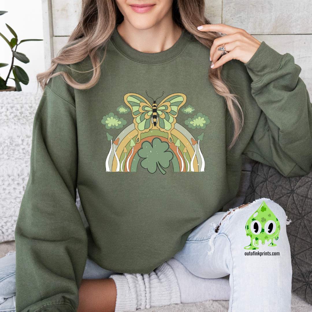 Front view of a green sweatshirt with a butterfly and rainbow design, celebrating St. Patrick's Day.