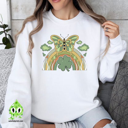Front view of a white sweatshirt with a butterfly and rainbow design, celebrating St. Patrick's Day.