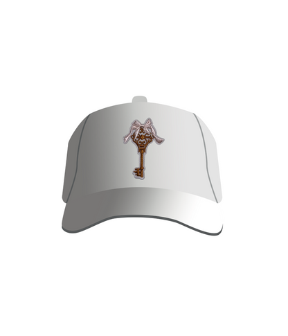 A white baseball cap with a vintage key and bow patch embroidered on the front.